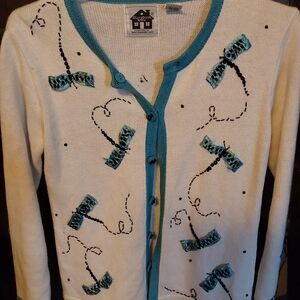 Cream Cardigan with Blue Bow Accents